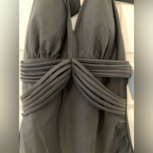 Beautiful & elegant slimming one piece black bathing suit. Tummy control size M